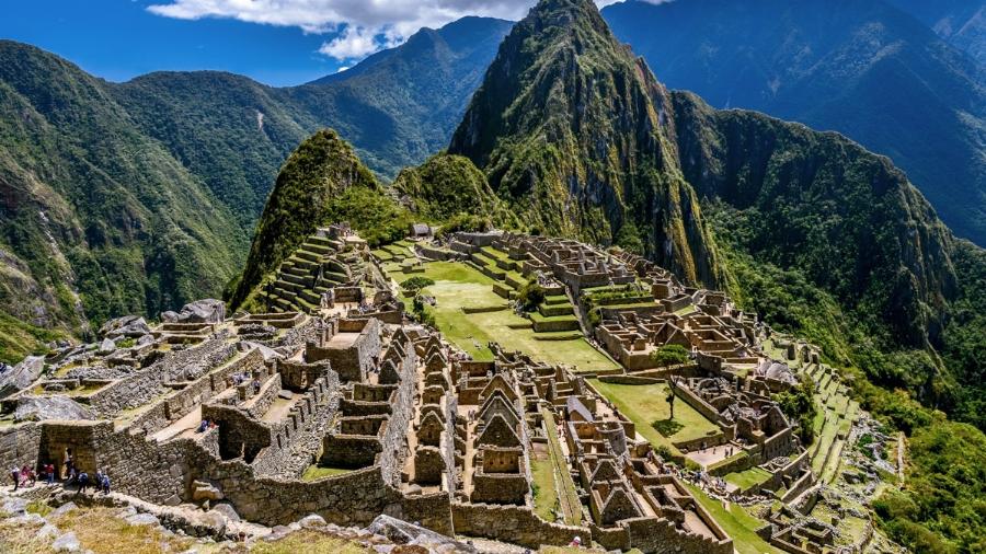 Ancient Inca people interacting with alpacas